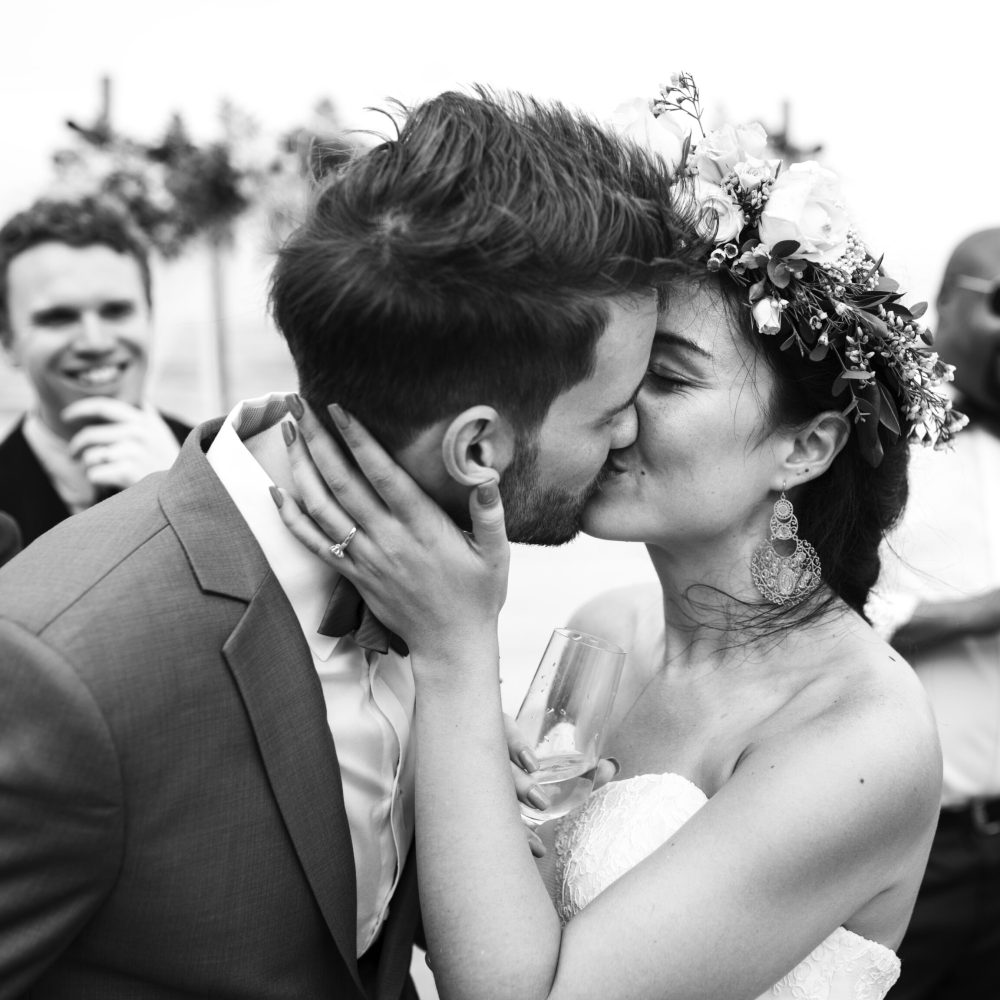 Wedding couple kissing each other